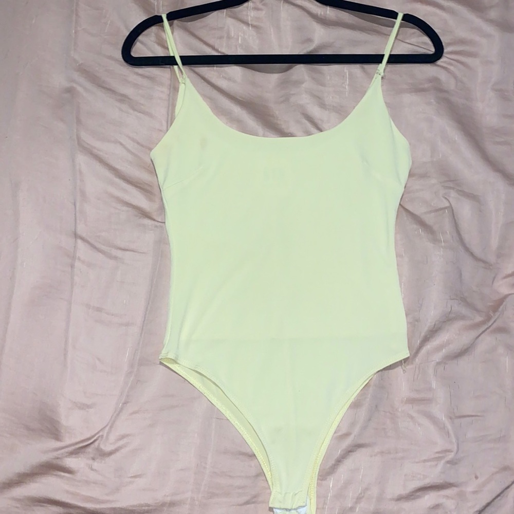 yellow boutique bodysuit